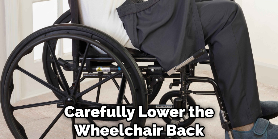 Carefully Lower the Wheelchair Back