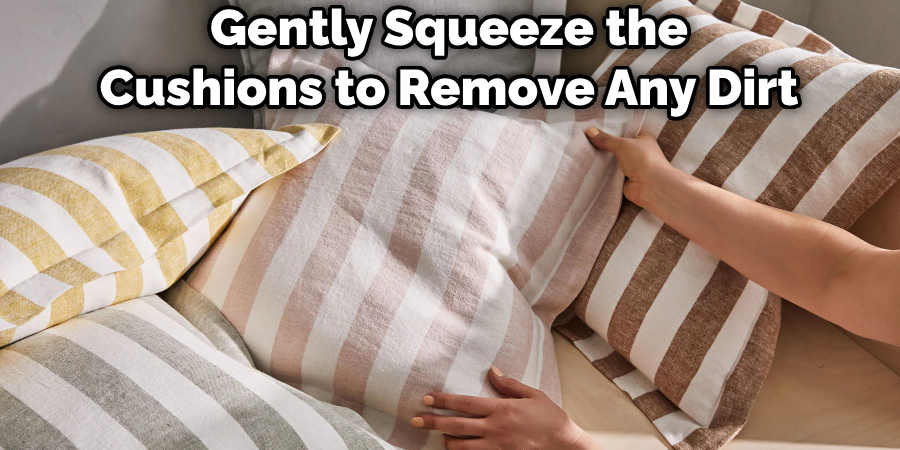 Gently Squeeze the Cushions to Remove Any Dirt