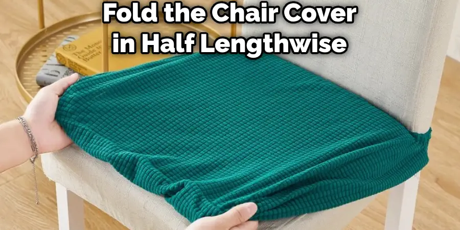 Fold the Chair Cover in Half Lengthwise