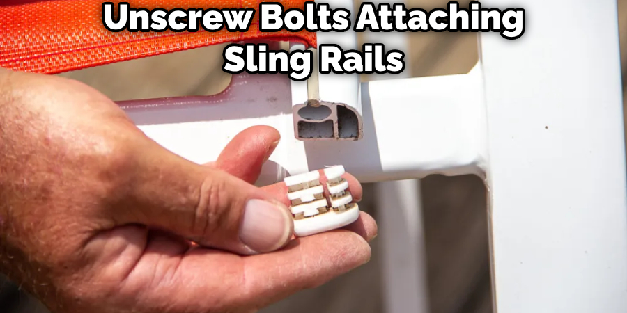 Unscrew Bolts Attaching Sling Rails